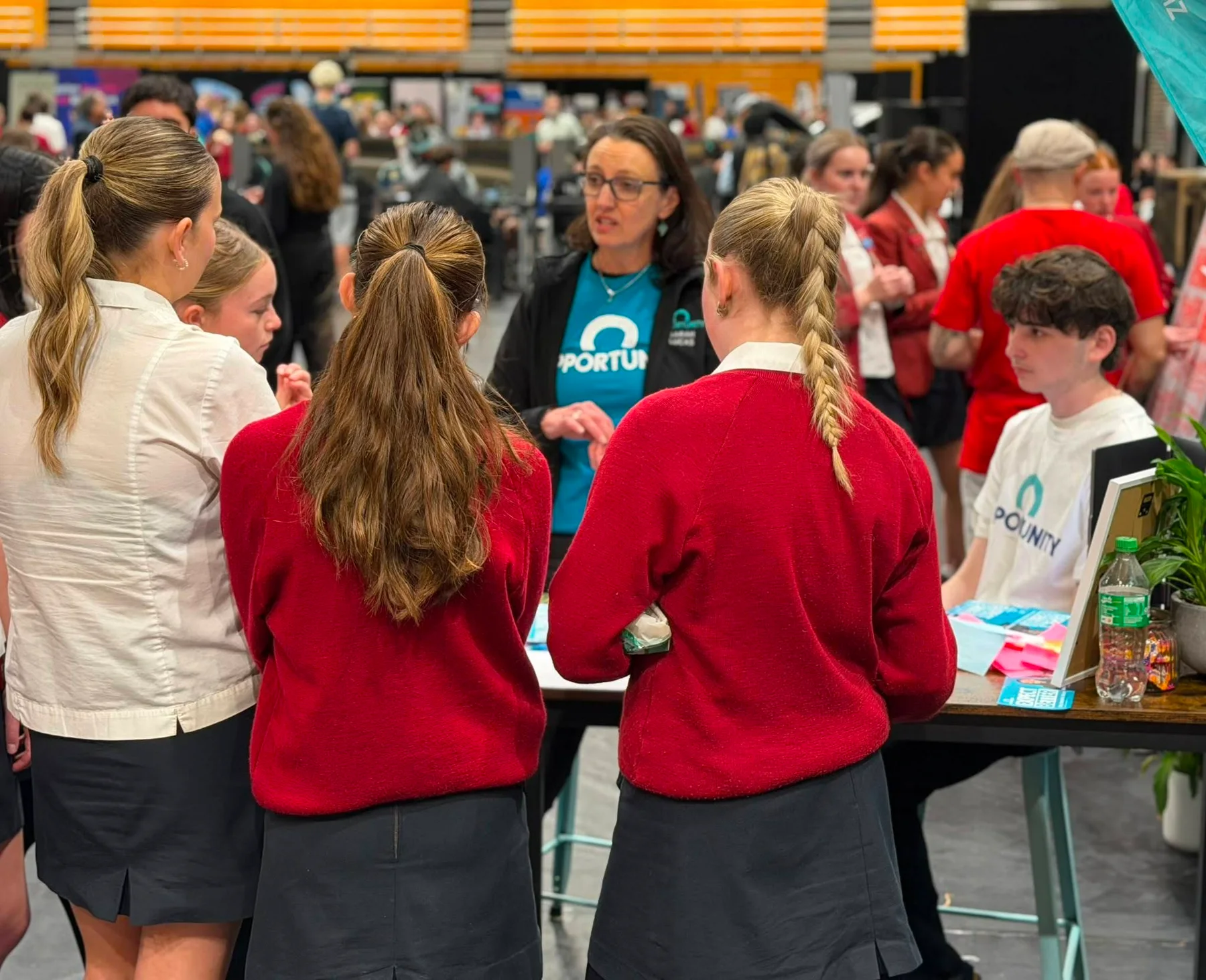 Sarah Lucas talking with young people in the New Plymouth community